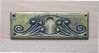 Schlüsselschild waagerecht aus Messing "Jugendstil" patiniert, 98x35 mm - 1 Stück